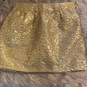 Place- gold skirt. Perfect for holiday pictures